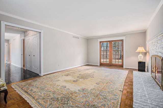 1625 Arlington Blvd, Ann Arbor, MI 48104 - unfurnished living room featuring ornamental molding, a fireplace, and french doors