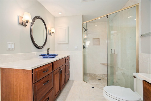 1625 Arlington Blvd, Ann Arbor, MI 48104 - bathroom with vanity, a stall shower, tile patterned floors, and tile walls