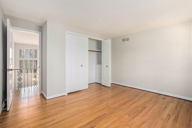 1625 Arlington Blvd, Ann Arbor, MI 48104 - unfurnished bedroom featuring light wood-type flooring and a closet