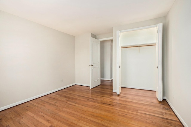 1625 Arlington Blvd, Ann Arbor, MI 48104 - unfurnished bedroom featuring light wood finished floors and a closet