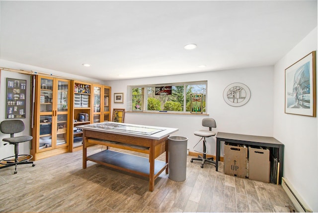 game room featuring baseboard heating, wood finished floors, baseboards, and recessed lighting