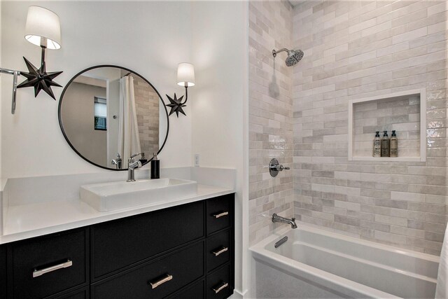 557 Greenwood Ave SE, East Grand Rapids, MI 49506 - full bathroom featuring vanity and  shower combination