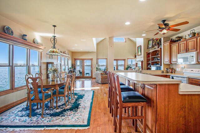 101 Lakeside Dr, Quincy, MI 49082 - dining area with baseboards, ceiling fan, recessed lighting, and light wood finished floors