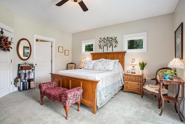 5091 E High Tower Lake Rd, Hesperia, MI 49421 - bedroom featuring a ceiling fan and light colored carpet
