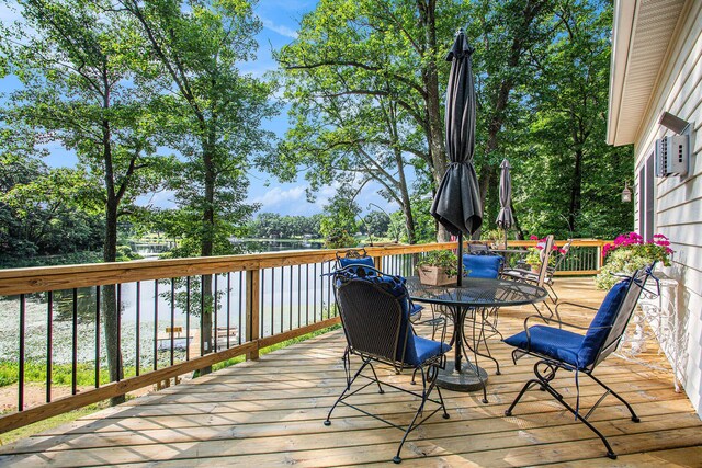 5091 E High Tower Lake Rd, Hesperia, MI 49421 - wooden deck featuring outdoor dining space