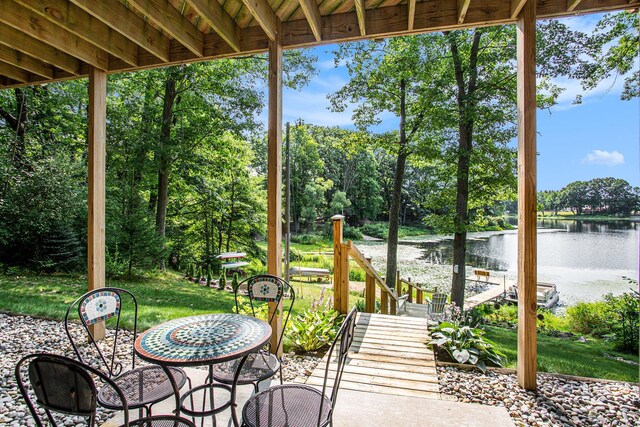 5091 E High Tower Lake Rd, Hesperia, MI 49421 - view of patio with a water view