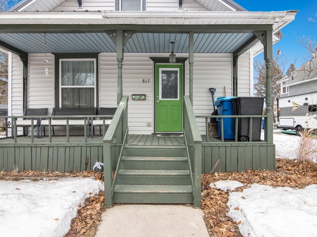 817 E Loomis St, Ludington, MI 49431 - property entrance with covered porch