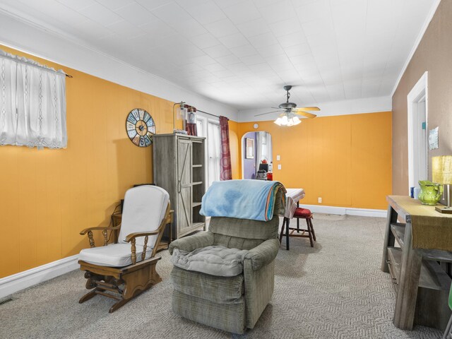 817 E Loomis St, Ludington, MI 49431 - interior space with baseboards, arched walkways, and a ceiling fan