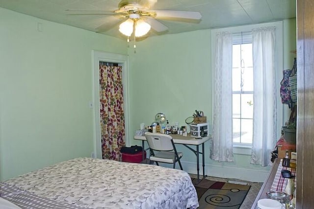 25544 Gage St, Dowagiac, MI 49047 - bedroom featuring a ceiling fan and baseboards