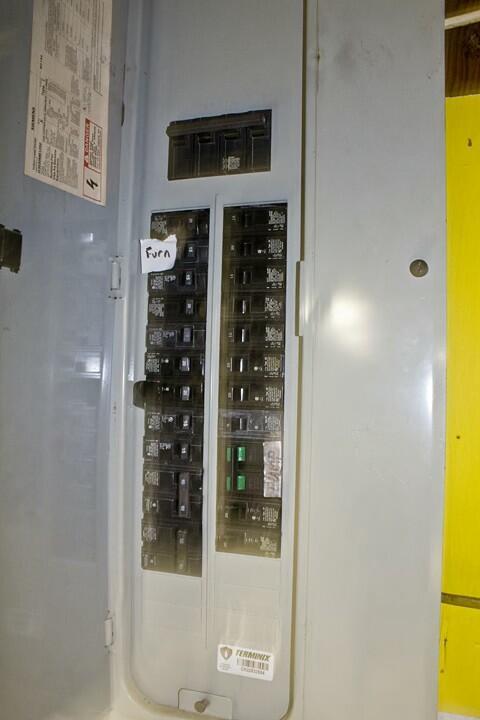 25544 Gage St, Dowagiac, MI 49047 - utility room featuring electric panel
