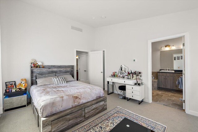 2824 Ridington Rd, Ann Arbor, MI 48105 - carpeted bedroom featuring a sink, baseboards, and visible vents