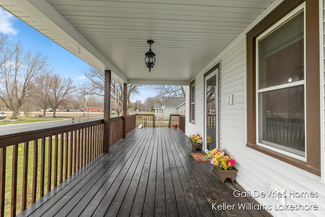 wooden deck featuring a porch