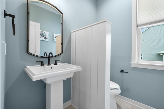 8114 Turning Stone, Kalamazoo, MI 49009 - bathroom with baseboards and toilet