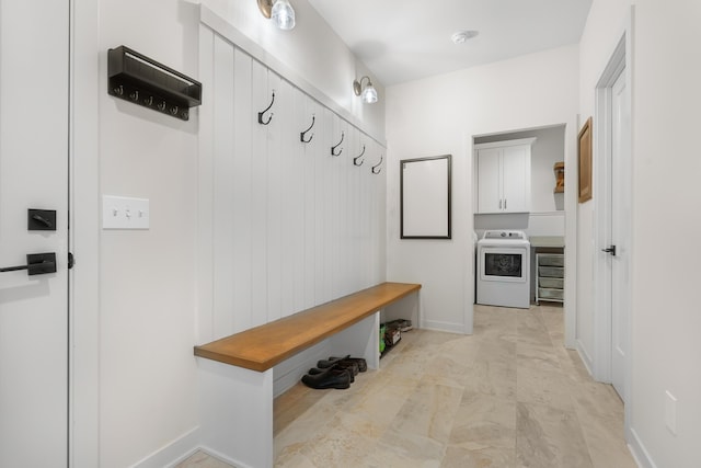 8114 Turning Stone, Kalamazoo, MI 49009 - mudroom featuring washer / dryer and baseboards
