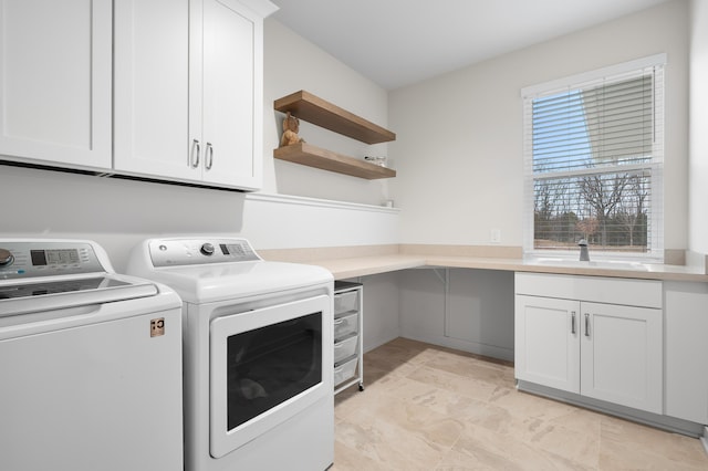 8114 Turning Stone, Kalamazoo, MI 49009 - laundry area with cabinet space, a sink, and independent washer and dryer