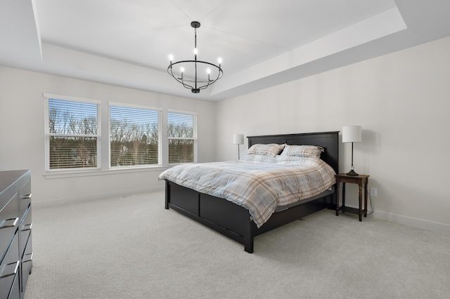 8114 Turning Stone, Kalamazoo, MI 49009 - bedroom featuring an inviting chandelier, a raised ceiling, and light carpet