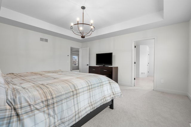 8114 Turning Stone, Kalamazoo, MI 49009 - bedroom featuring light colored carpet, visible vents, a notable chandelier, and a raised ceiling