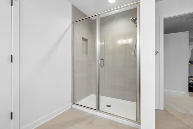 8114 Turning Stone, Kalamazoo, MI 49009 - full bathroom with baseboards, tile patterned flooring, and a shower stall