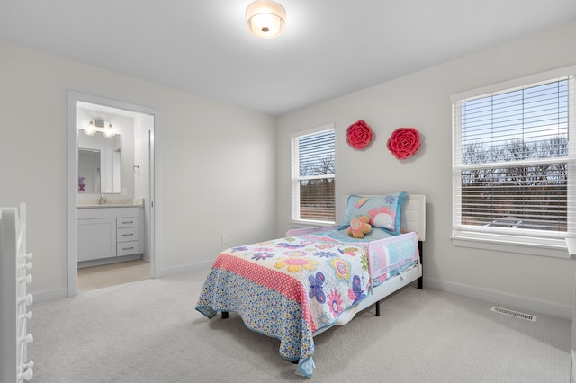 8114 Turning Stone, Kalamazoo, MI 49009 - bedroom featuring light carpet, baseboards, visible vents, and connected bathroom