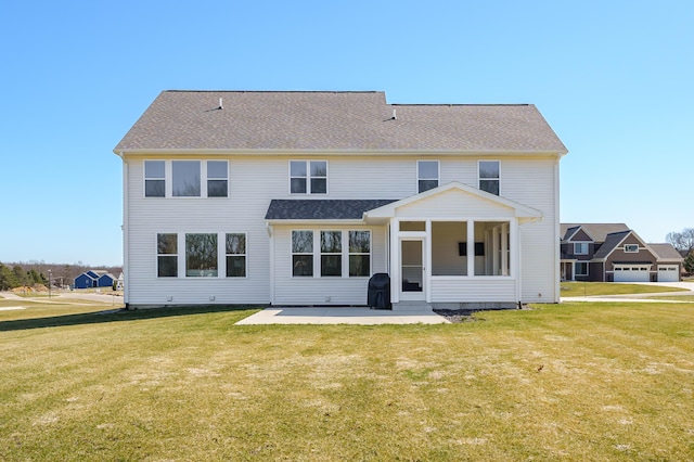 8114 Turning Stone, Kalamazoo, MI 49009 - back of house with a patio, a sunroom, and a lawn