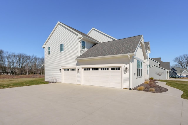 8114 Turning Stone, Kalamazoo, MI 49009 - view of property exterior with driveway and a shingled roof