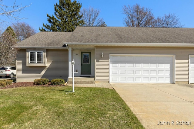 7588 Rivendell Dr SE, Grand Rapids, MI 49508 - ranch-style house featuring concrete driveway, a garage, roof with shingles, and a front lawn