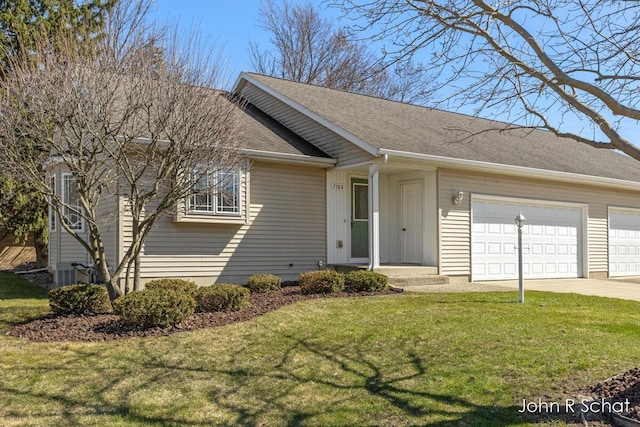 7588 Rivendell Dr SE, Grand Rapids, MI 49508 - ranch-style house with roof with shingles, an attached garage, driveway, central AC unit, and a front lawn