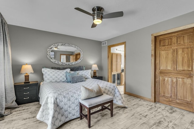 11262 Lemott Cir, Jerome, MI 49249 - bedroom featuring baseboards, visible vents, light wood-type flooring, and a ceiling fan