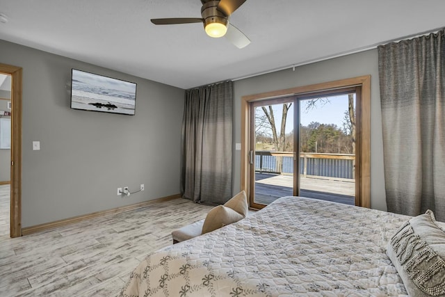 11262 Lemott Cir, Jerome, MI 49249 - bedroom with baseboards, access to exterior, wood finished floors, and a ceiling fan