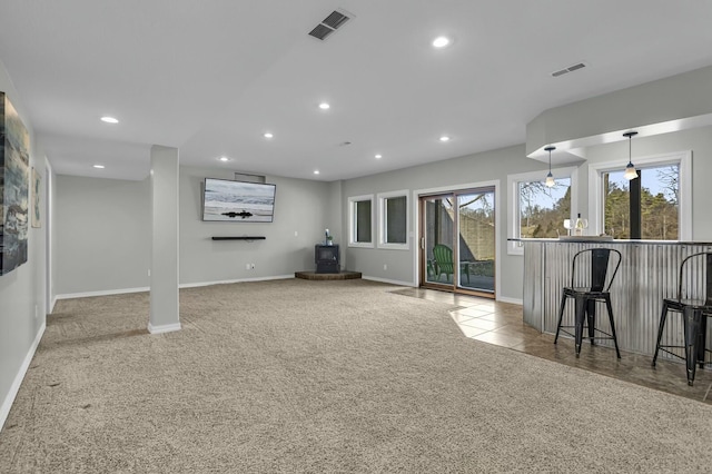11262 Lemott Cir, Jerome, MI 49249 - unfurnished living room with recessed lighting, carpet floors, and visible vents