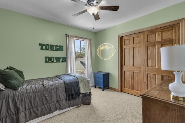 11262 Lemott Cir, Jerome, MI 49249 - bedroom with baseboards, light colored carpet, and ceiling fan