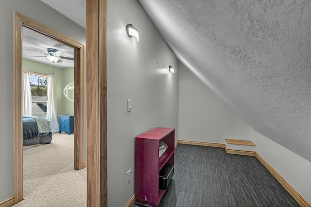 11262 Lemott Cir, Jerome, MI 49249 - bonus room with baseboards, a textured ceiling, a ceiling fan, and carpet
