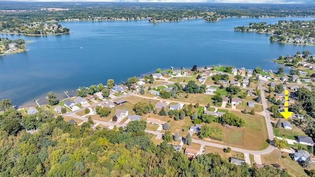 aerial view featuring a residential view and a water view