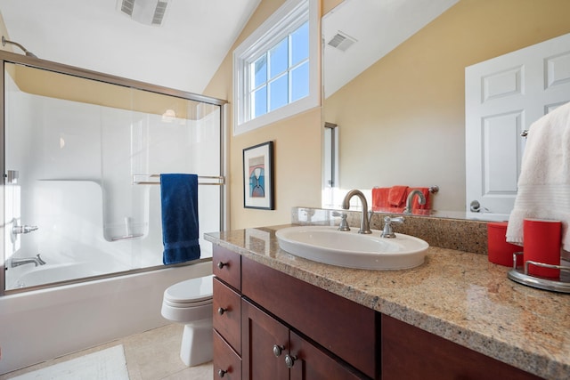 full bathroom featuring tile patterned floors, visible vents, toilet, and lofted ceiling