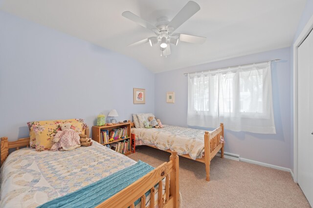4103 Lake Shore Dr, New Buffalo, MI 49117 - bedroom with a ceiling fan, a baseboard heating unit, baseboards, lofted ceiling, and carpet flooring