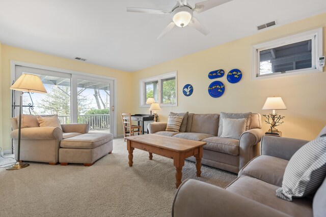 4103 Lake Shore Dr, New Buffalo, MI 49117 - living area with carpet floors, visible vents, and ceiling fan