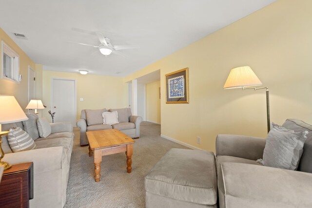 4103 Lake Shore Dr, New Buffalo, MI 49117 - carpeted living area featuring baseboards, a ceiling fan, and visible vents