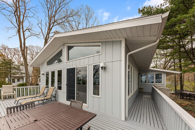 4103 Lake Shore Dr, New Buffalo, MI 49117 - wooden deck featuring outdoor dining area