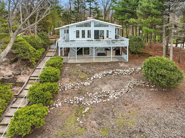 4103 Lake Shore Dr, New Buffalo, MI 49117 - back of property featuring a wooden deck and stairs