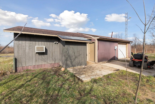 19372 M 140, South Haven, MI 49090 - exterior space featuring driveway, an outdoor structure, and a garage