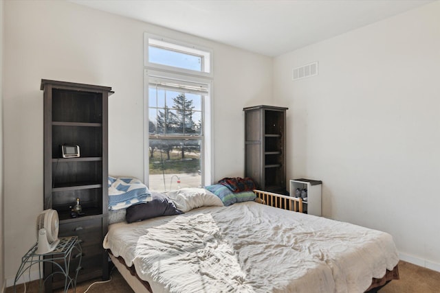 19372 M 140, South Haven, MI 49090 - carpeted bedroom featuring baseboards and visible vents