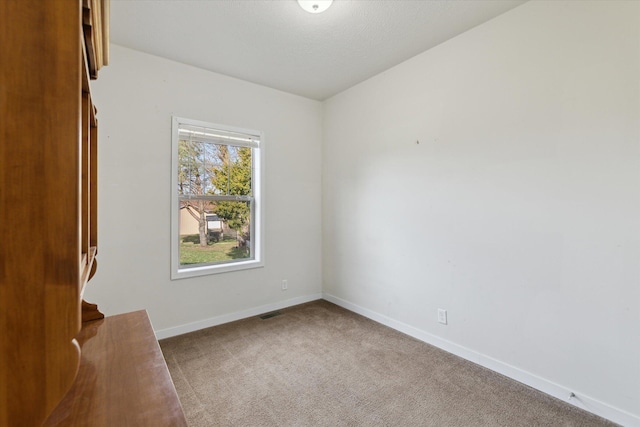 19372 M 140, South Haven, MI 49090 - carpeted spare room with baseboards and visible vents