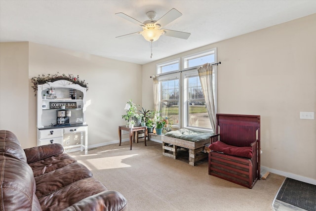 19372 M 140, South Haven, MI 49090 - carpeted living area featuring baseboards and ceiling fan