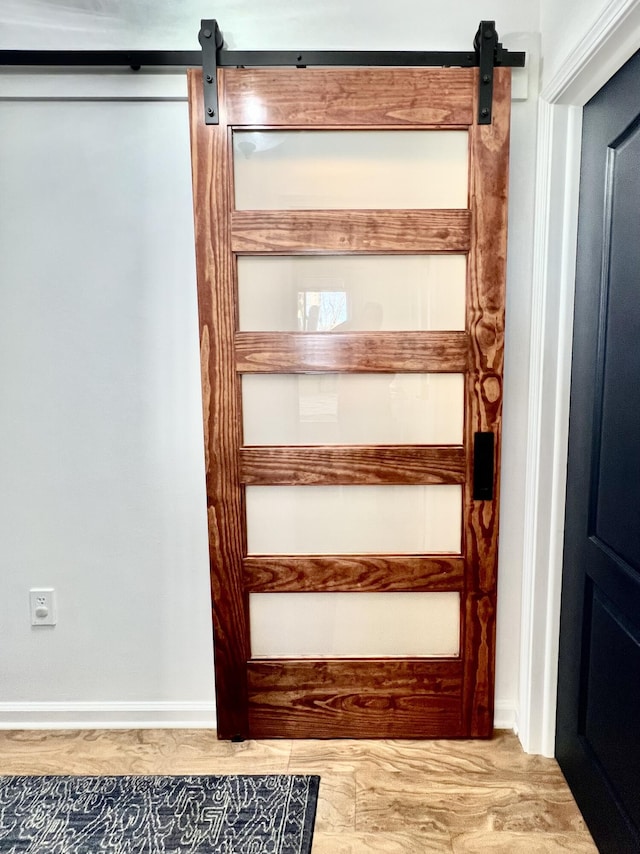 stairs featuring a barn door