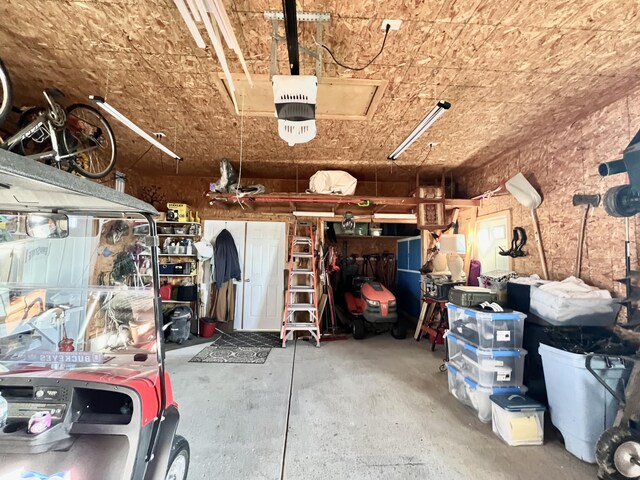garage featuring a garage door opener