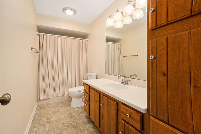 17650 Woodbridge Rd # 1, Spring Lake, MI 49456 - bathroom featuring toilet, vanity, baseboards, and a shower with shower curtain