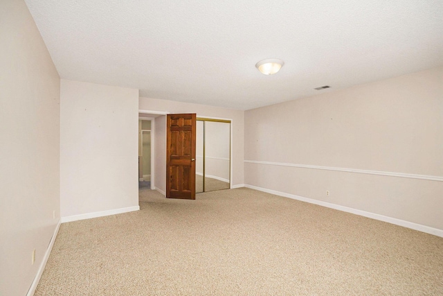 17650 Woodbridge Rd # 1, Spring Lake, MI 49456 - empty room featuring light carpet and baseboards