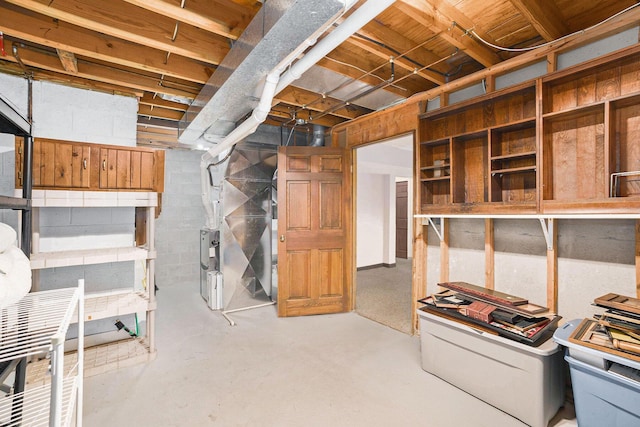 17650 Woodbridge Rd # 1, Spring Lake, MI 49456 - unfinished below grade area with heating unit