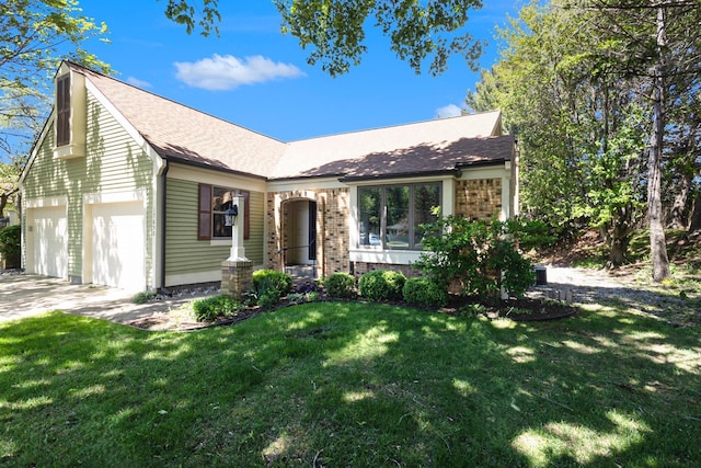17650 Woodbridge Rd # 1, Spring Lake, MI 49456 - view of front facade featuring brick siding, a front lawn, concrete driveway, roof with shingles, and a garage
