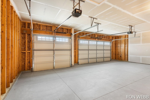 garage featuring a garage door opener